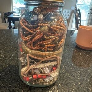 Jar of Mixed Jewelry with Beads, Earrings, Necklaces and Bracelets.
